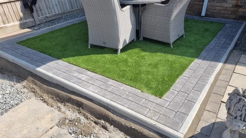 artificial grass with block paved border basildon essex 07